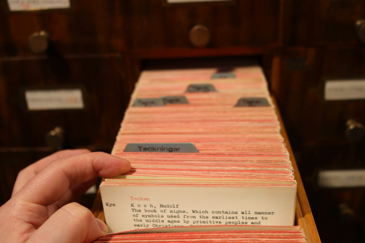 A library card catalogue drawer with labelled dividers